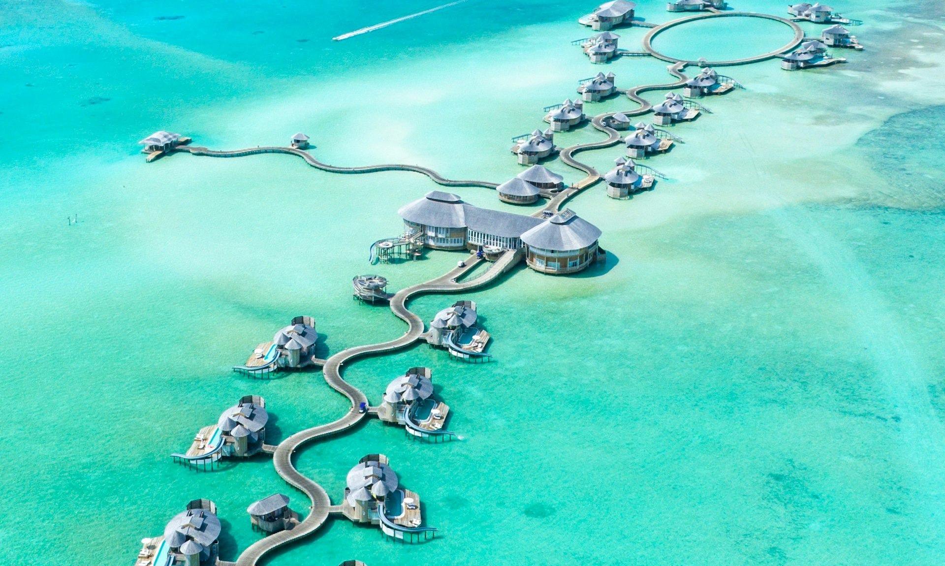 Aerial view of overwater villas in the Maldives